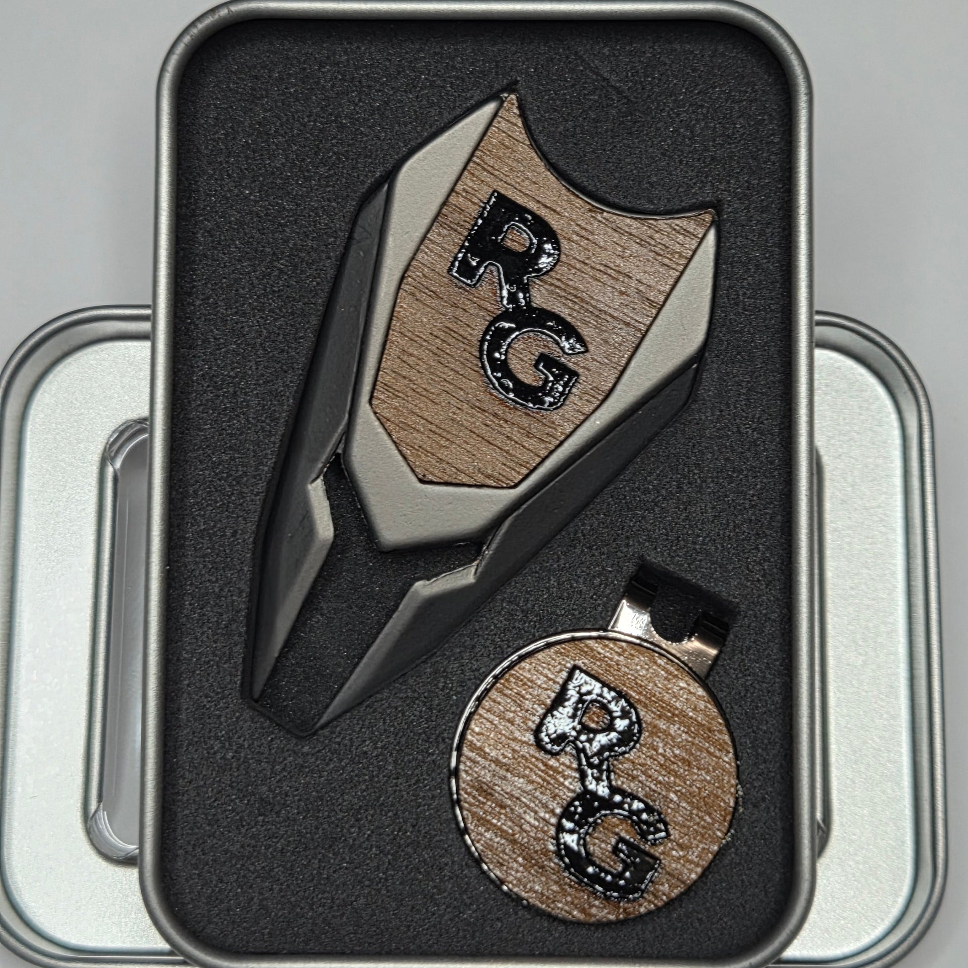 Wooden stamp and ink pad with 'BC' initials in a black holder on a gray background