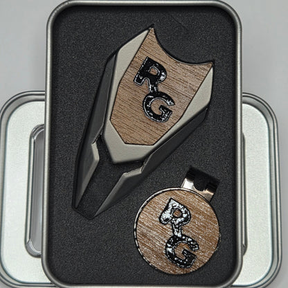 Wooden stamp and ink pad with 'BC' initials in a black holder on a gray background