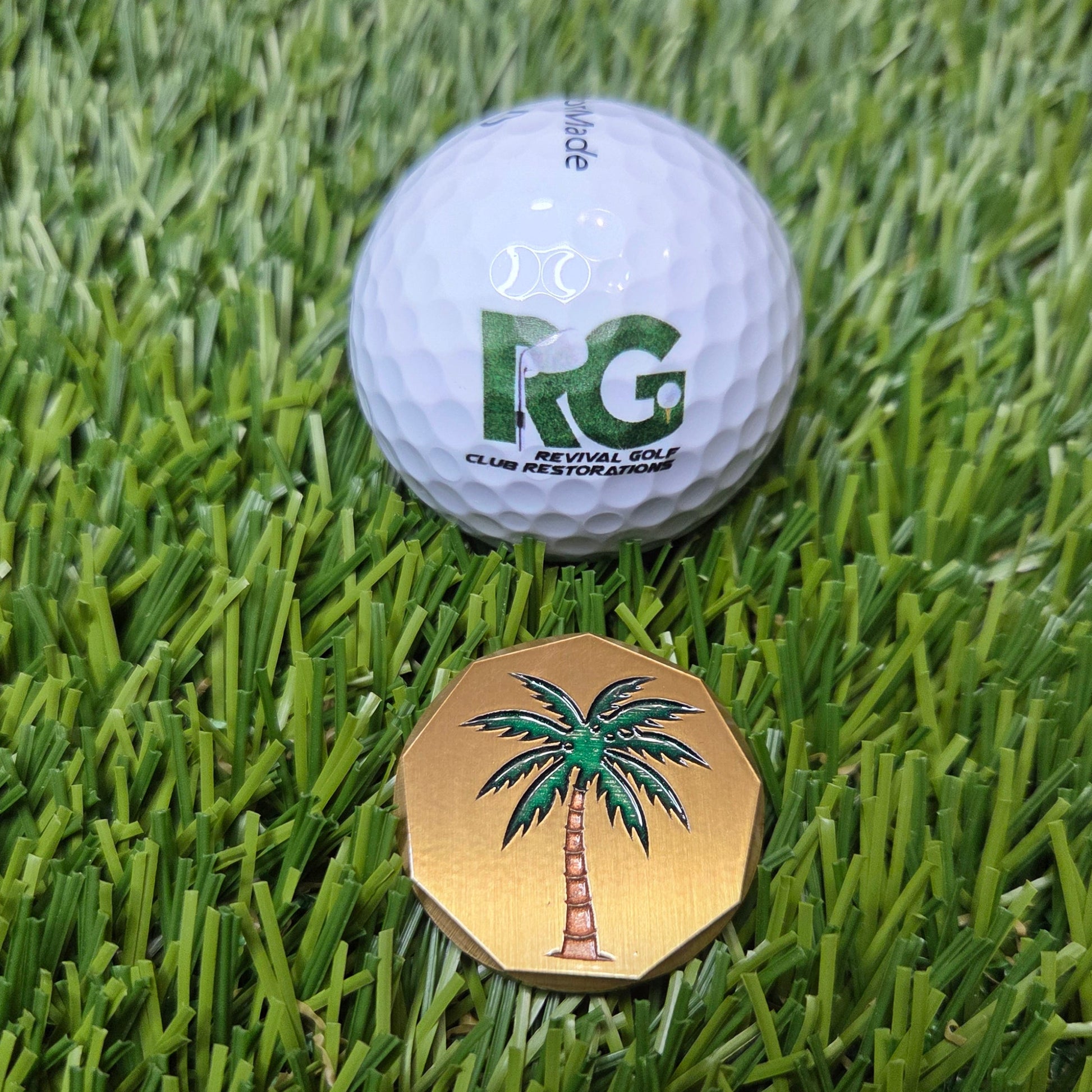 Golf ball and cap on a grassy surface